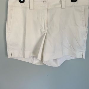 Nike white golf shorts for women, size 8.